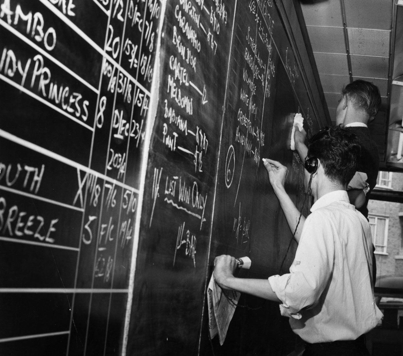 Archival black-and-white photograph of an odds board